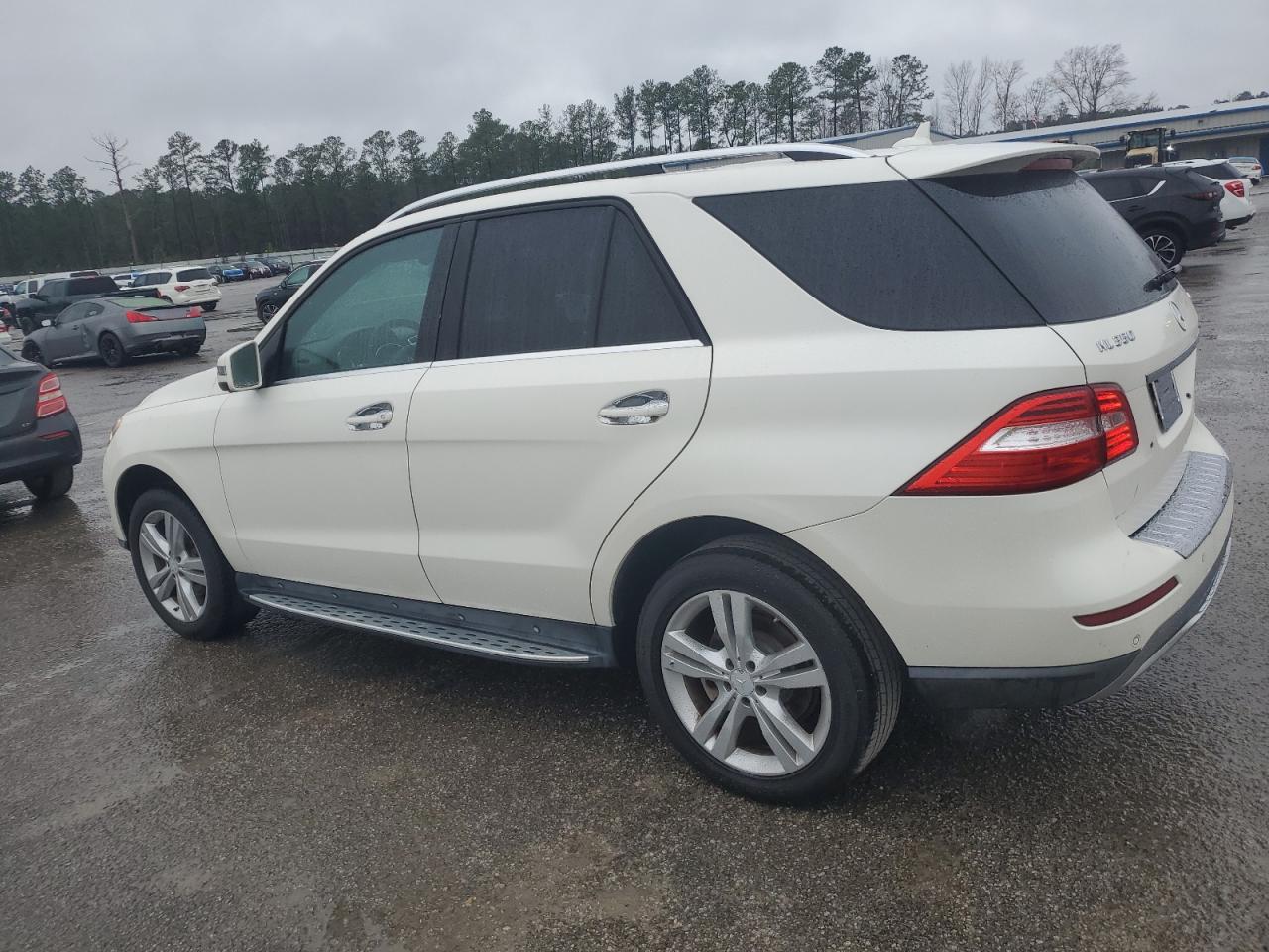 2014 Mercedes-Benz M-klasse VIN 4JGDA5HB2EA285797 Copart auction photo, side damage thumbnail 2