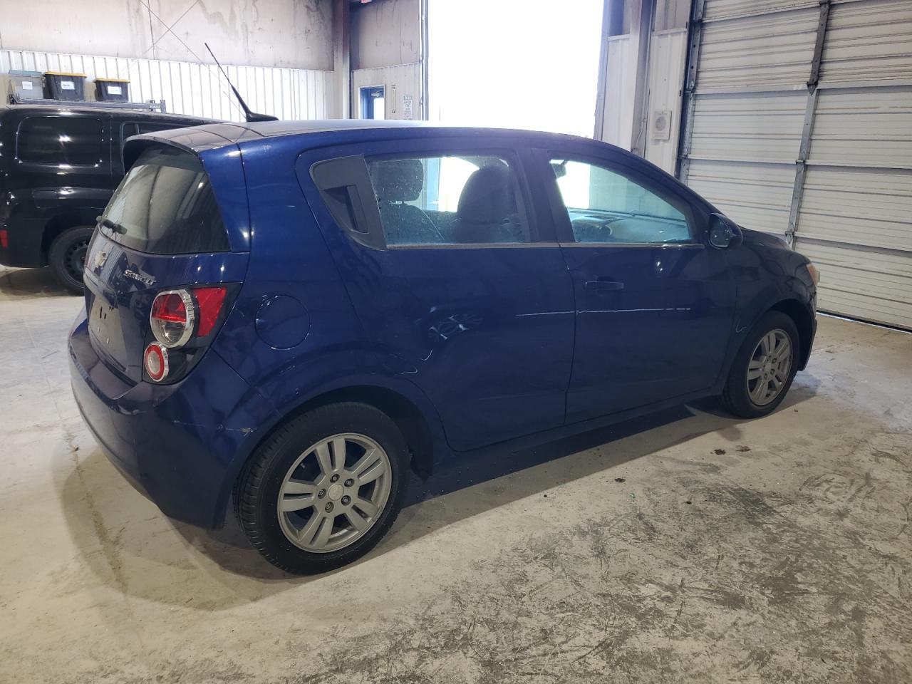 2014 Chevrolet Sonic VIN 1G1JC6SH9E4231585 Copart auction photo, side / rear end damage thumbnail 3