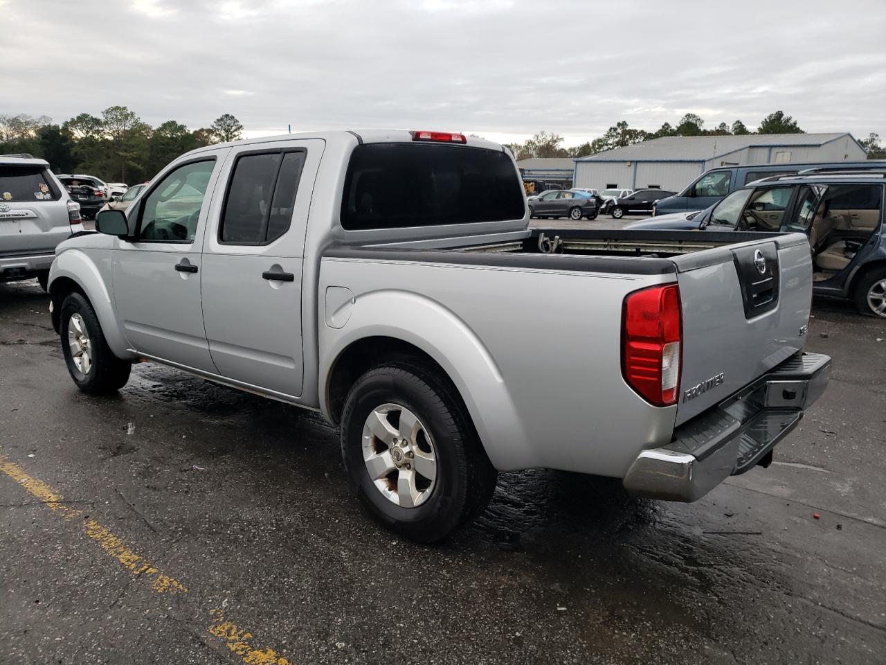 2009 Nissan Navara (Frontier) VIN 1N6AD07U29C424774 Copart auction photo, front end / side damage thumbnail 2