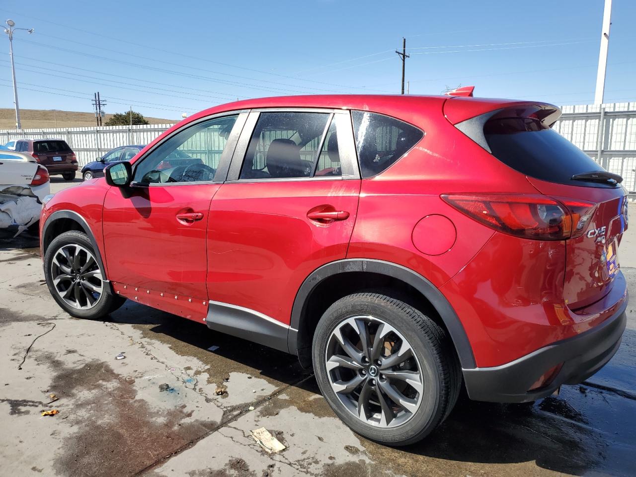 2016 Mazda CX-5 VIN JM3KE4DY0G0892219 Copart auction photo, undercarriage / side damage thumbnail 2