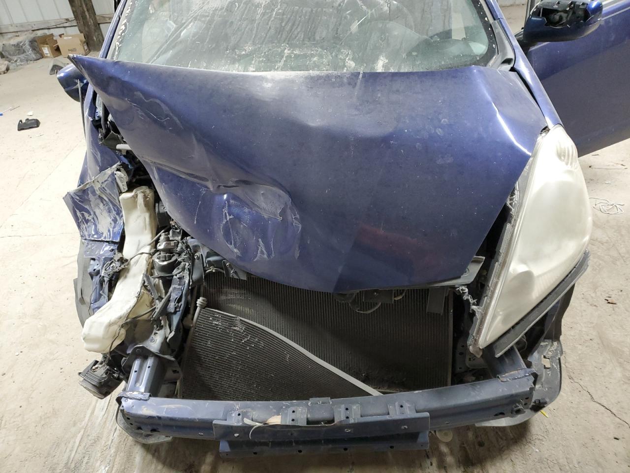 2009 Honda Fit VIN JHMGE88429S053854 Copart auction photo, all over damage thumbnail 11