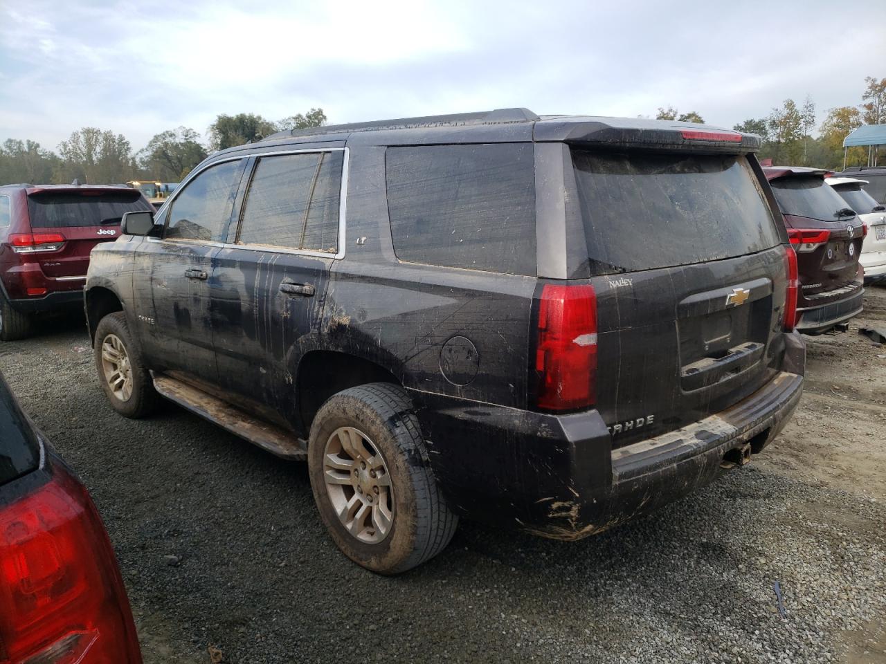 2015 Chevrolet Tahoe VIN 1GNSKBKC9FR636725 Copart auction photo, water/flood damage thumbnail 2