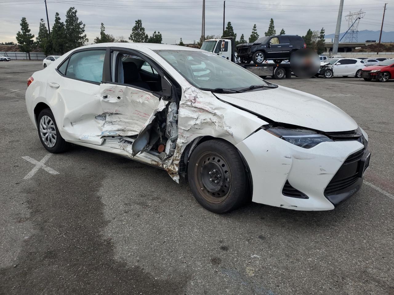 2018 Toyota Corolla VIN 5YFBURHE5JP799976 Copart auction photo, all over damage thumbnail 4