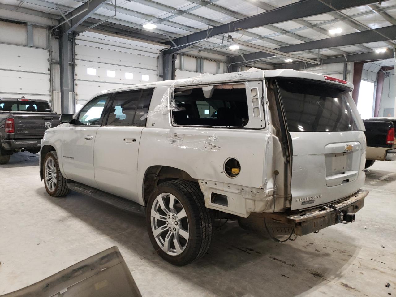 2015 Chevrolet Suburban VIN 1GNSKJKC9FR534335 Copart auction photo, rear end damage thumbnail 2