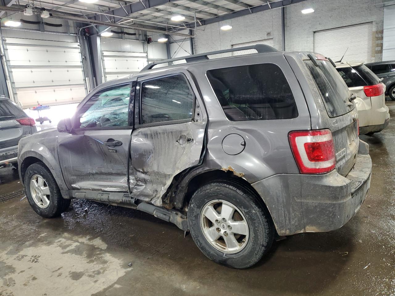 2011 Ford Escape VIN 1FMCU9D79BKB78926 Copart auction photo, side / rear end damage thumbnail 2