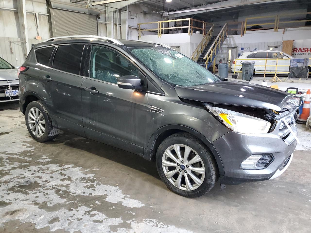 2017 Ford Escape VIN 1FMCU0J94HUD09078 Copart auction photo, front end / minor dent/scratches damage thumbnail 4
