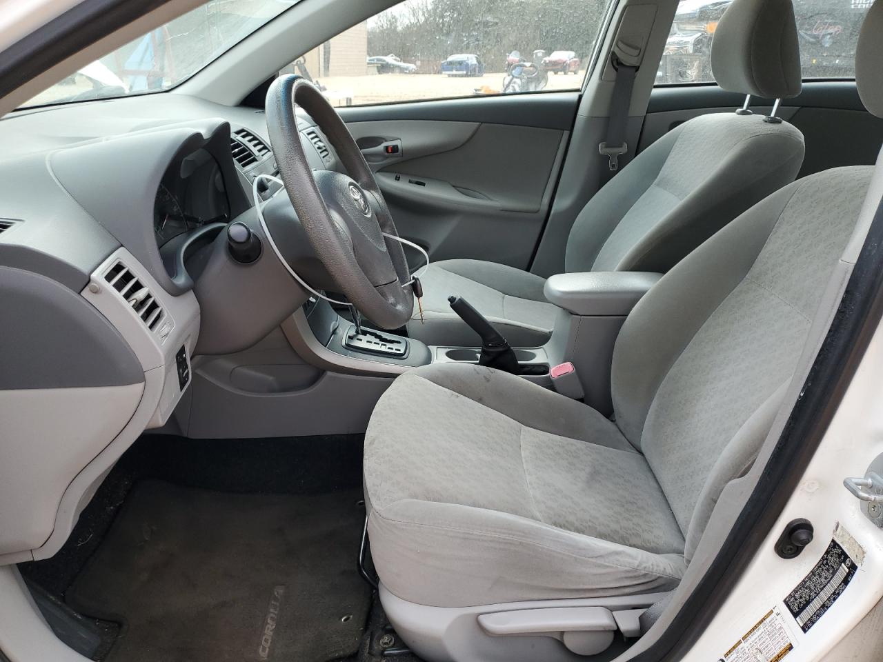2009 Toyota Corolla VIN JTDBL40EX99086686 Copart auction photo, all over damage thumbnail 7