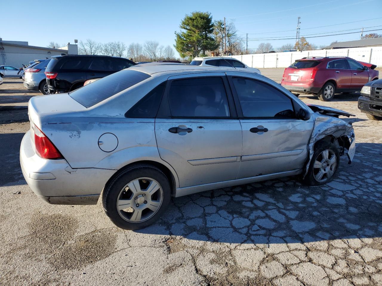 2005 Ford Focus VIN 1FAHP34NX5W196805 Copart auction photo, all over damage thumbnail 3