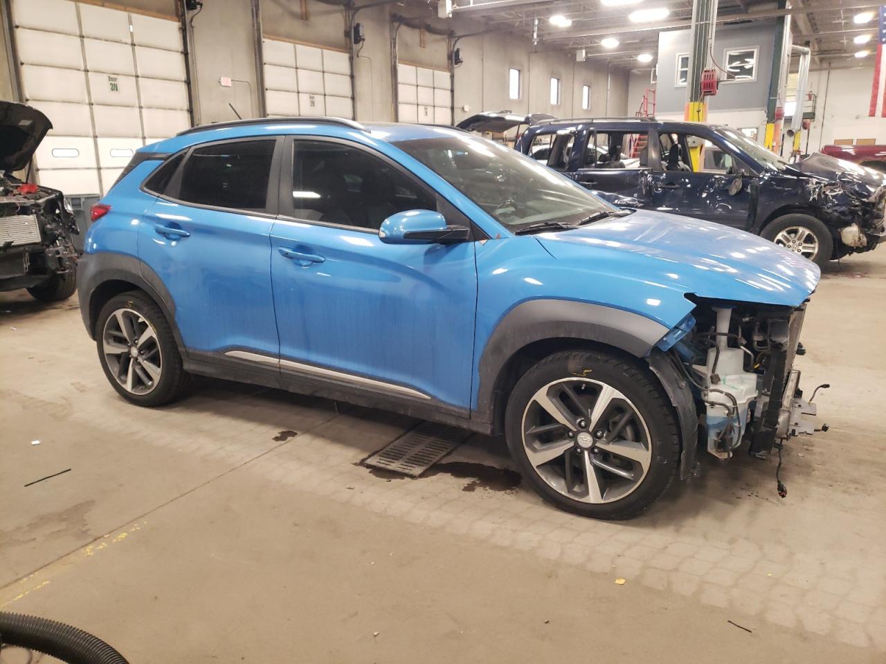 2018 Hyundai Kona VIN KM8K5CA57JU064659 Copart auction photo, front end damage thumbnail 4