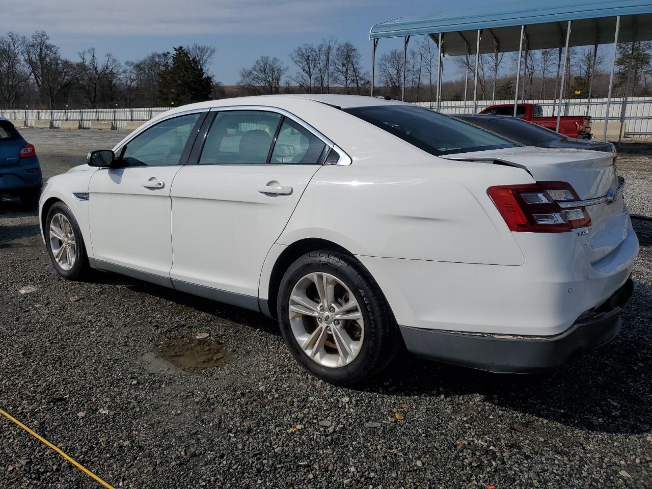 2016 Ford Taurus VIN 1FAHP2E96GG128073 Copart auction photo, rear end damage thumbnail 2