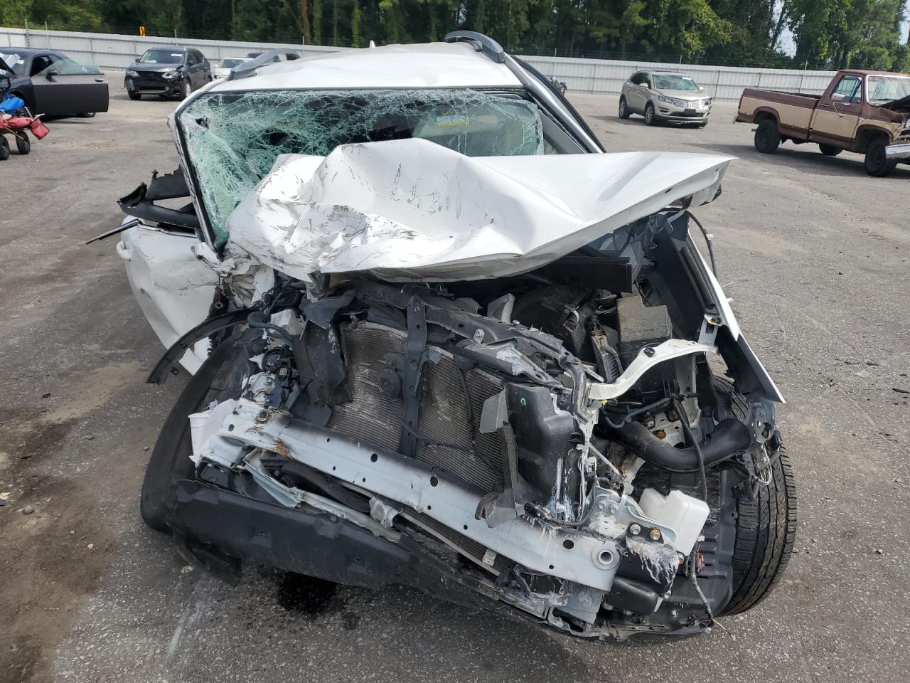 2017 Toyota RAV 4 VIN JTMZFREV4HJ126737 Copart auction photo, all over damage thumbnail 5