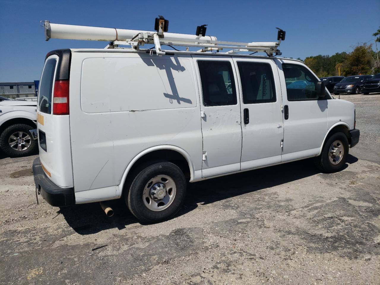 2012 Chevrolet Express VIN 1GCWGFCG6C1190497 Copart auction photo, minor dent/scratches damage thumbnail 3