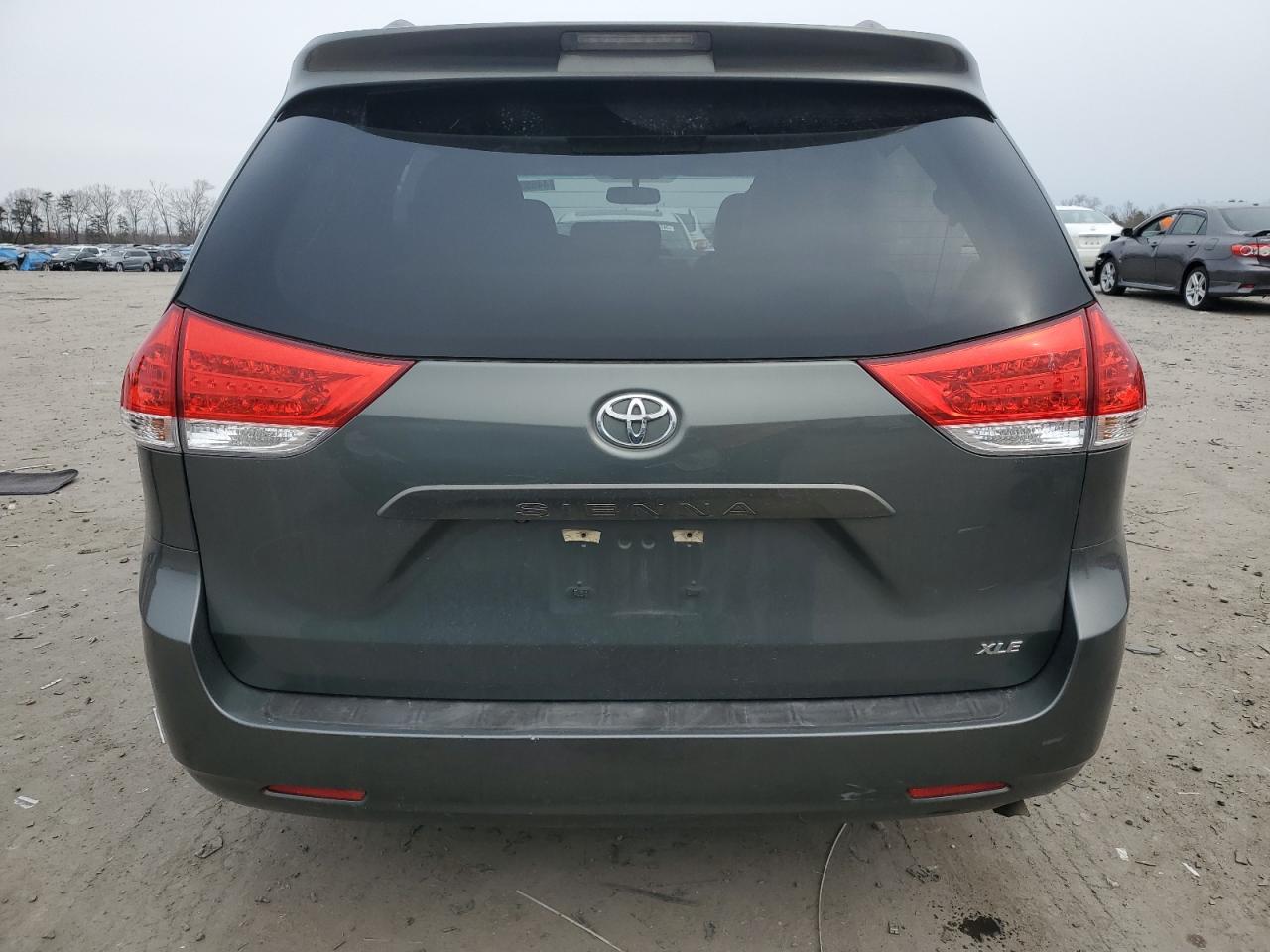 2014 Toyota Sienna VIN 5TDYK3DC2ES521888 Copart auction photo, all over damage thumbnail 6