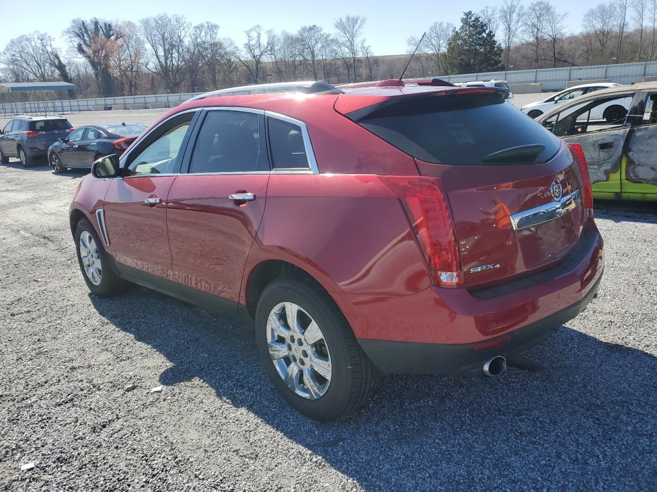 2016 Cadillac SRX VIN 3GYFNEE31GS576818 Copart auction photo, side damage thumbnail 2