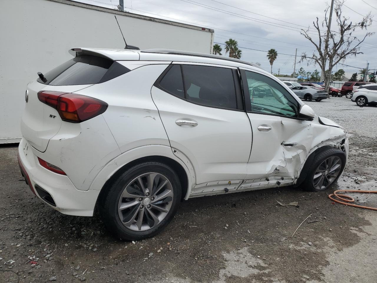 2020 Buick Encore VIN KL4MMDS21LB133879 Copart auction photo, side / front end damage thumbnail 3