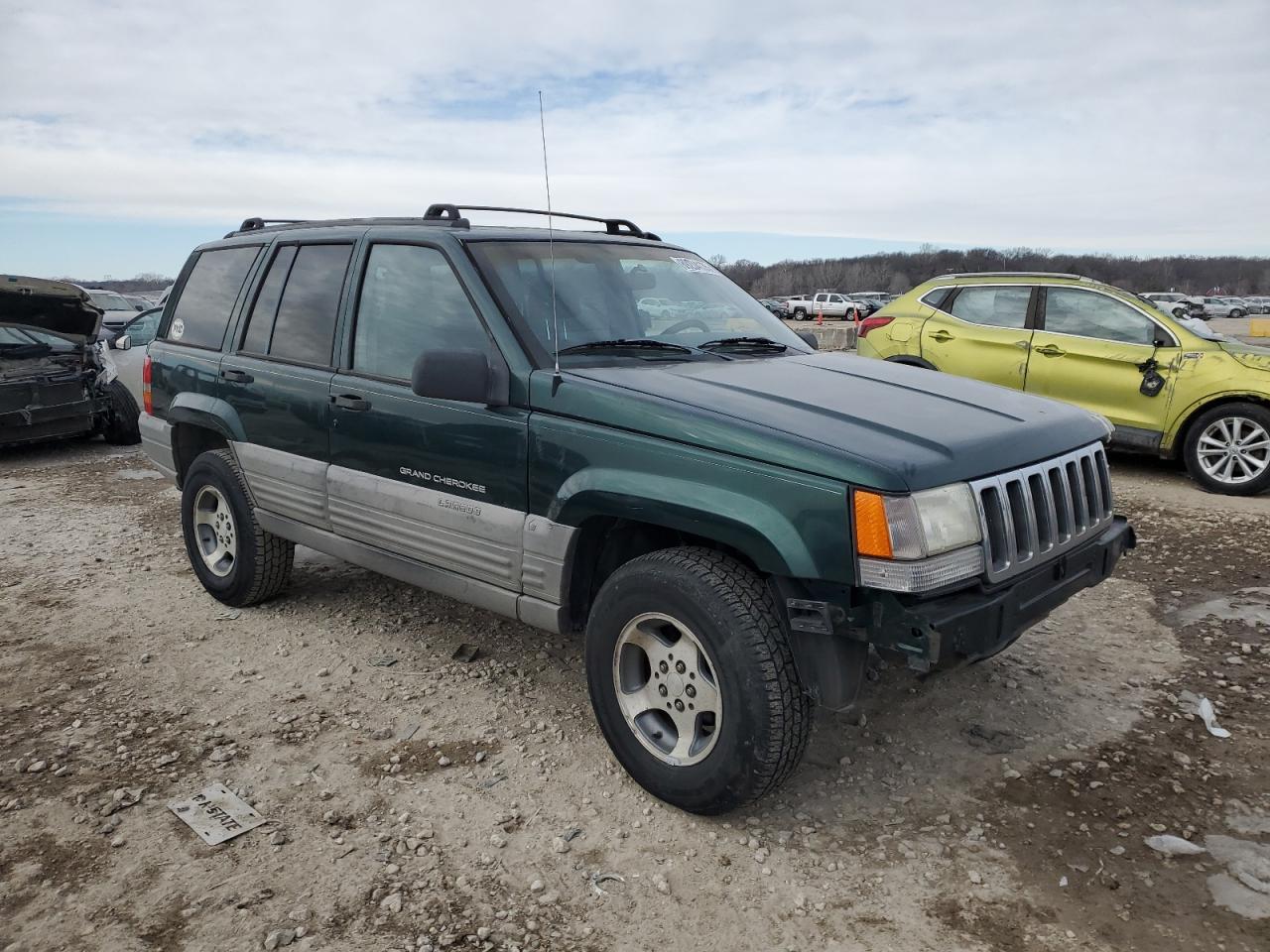 1998 Jeep Grand Cherokee VIN 1J4GZ58S5WC285562 Copart auction photo, side / front end damage thumbnail 4