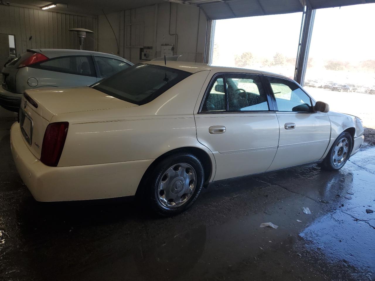 2001 Cadillac De Ville VIN 1G6KE57Y91U256346 Copart auction photo, front end / side damage thumbnail 3