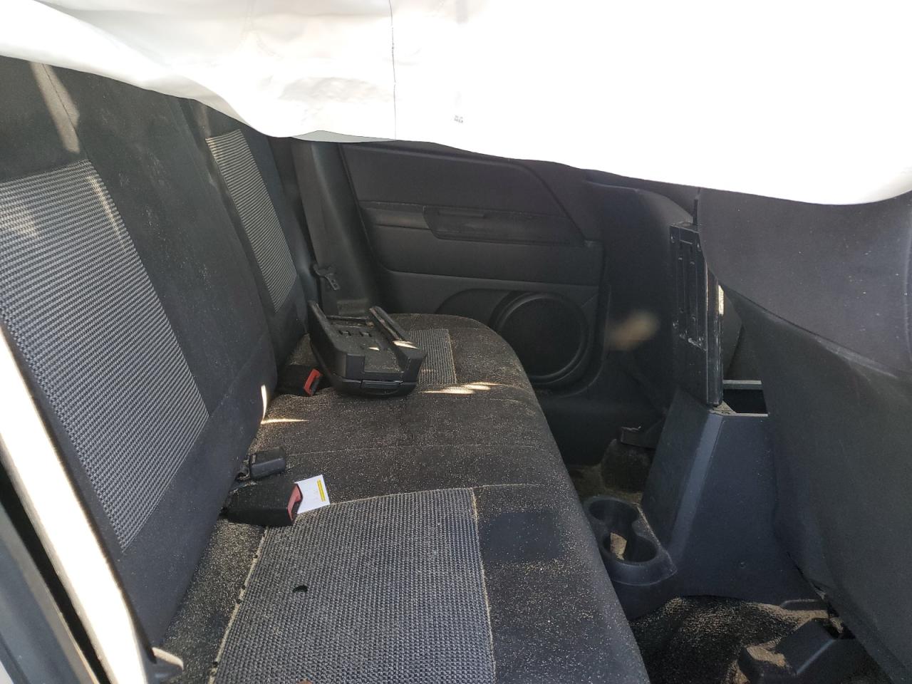 2011 Jeep Liberty (Patriot) VIN 1J4NT1GA0BD285371 Copart auction photo, all over damage thumbnail 11
