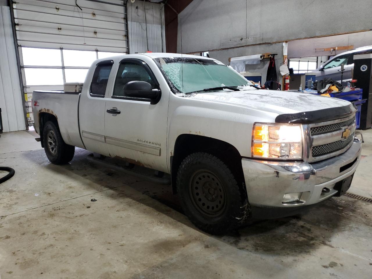2013 Chevrolet Silverado VIN 1GCRCSE05DZ312657 Copart auction photo, normal wear damage thumbnail 4