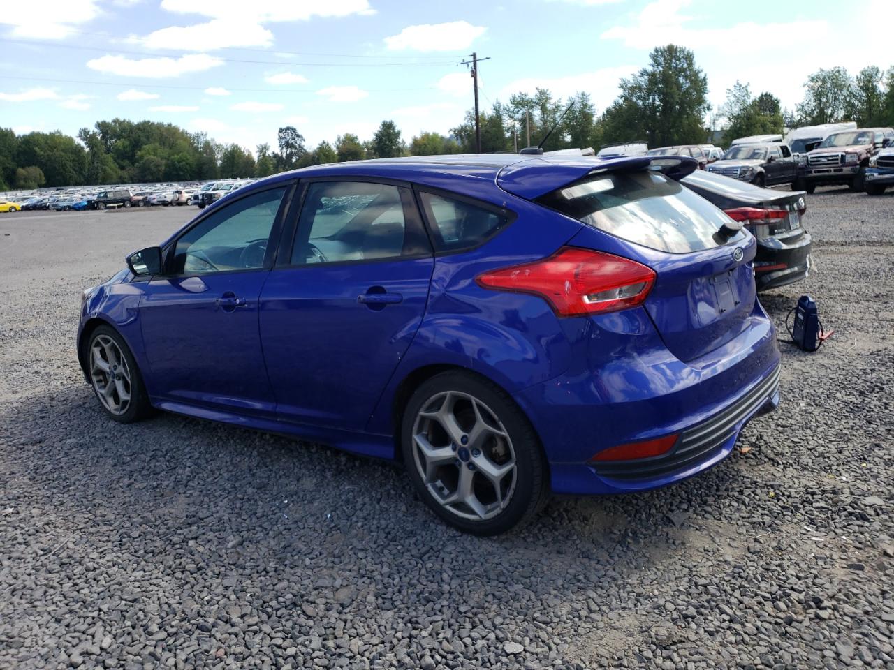 2015 Ford Focus VIN 1FADP3L94FL380479 Copart auction photo, vandalism / all over damage thumbnail 2