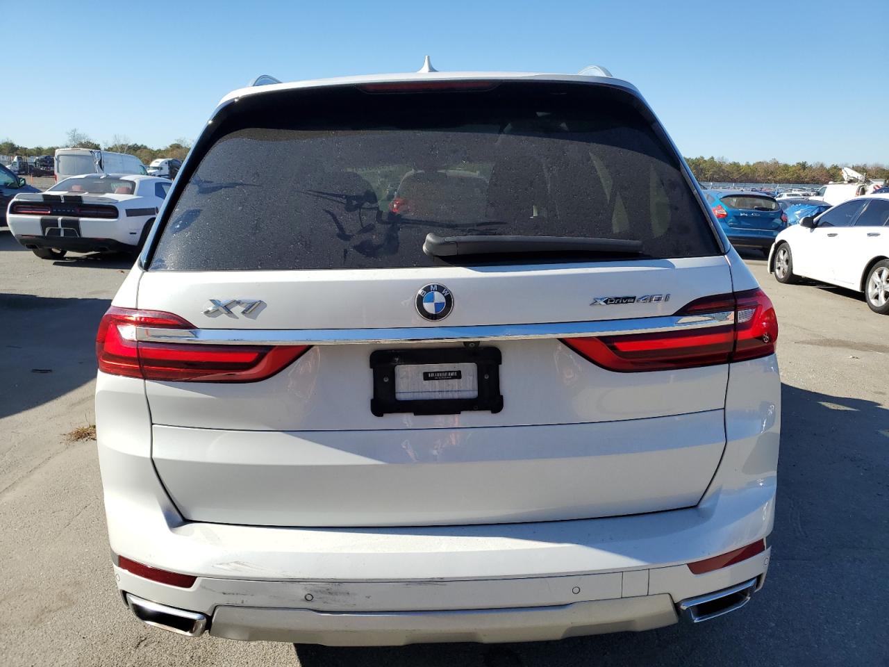2020 BMW X7 VIN 5UXCW2C00L9B66295 Copart auction photo, undercarriage / minor dent/scratches damage thumbnail 6