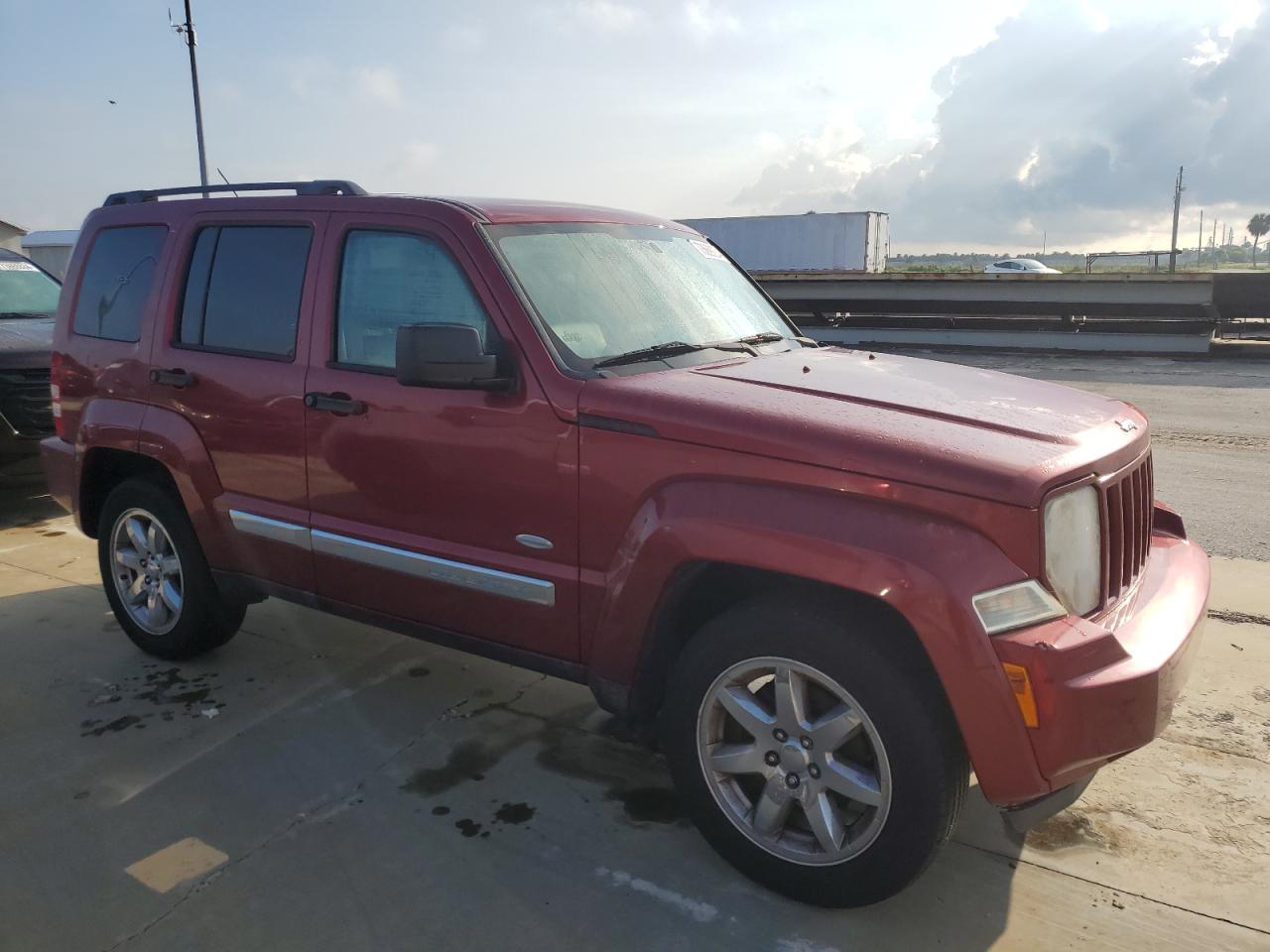 2012 Jeep Liberty (North America) VIN 1C4PJLAK4CW214066 Copart auction photo, water/flood damage thumbnail 4