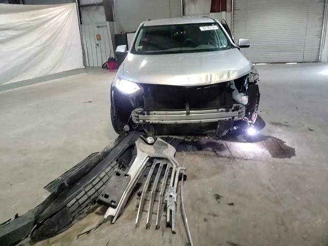 2021 Chevrolet Traverse VIN 1GNEVHKW5MJ216392 Copart auction photo, front end / side damage thumbnail 11