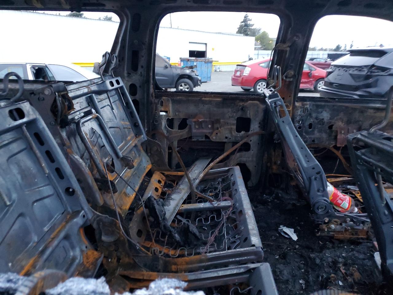 2009 Chevrolet Suburban VIN 1GNFK26329R281980 Copart auction photo, burn / missing/altered vin damage thumbnail 11
