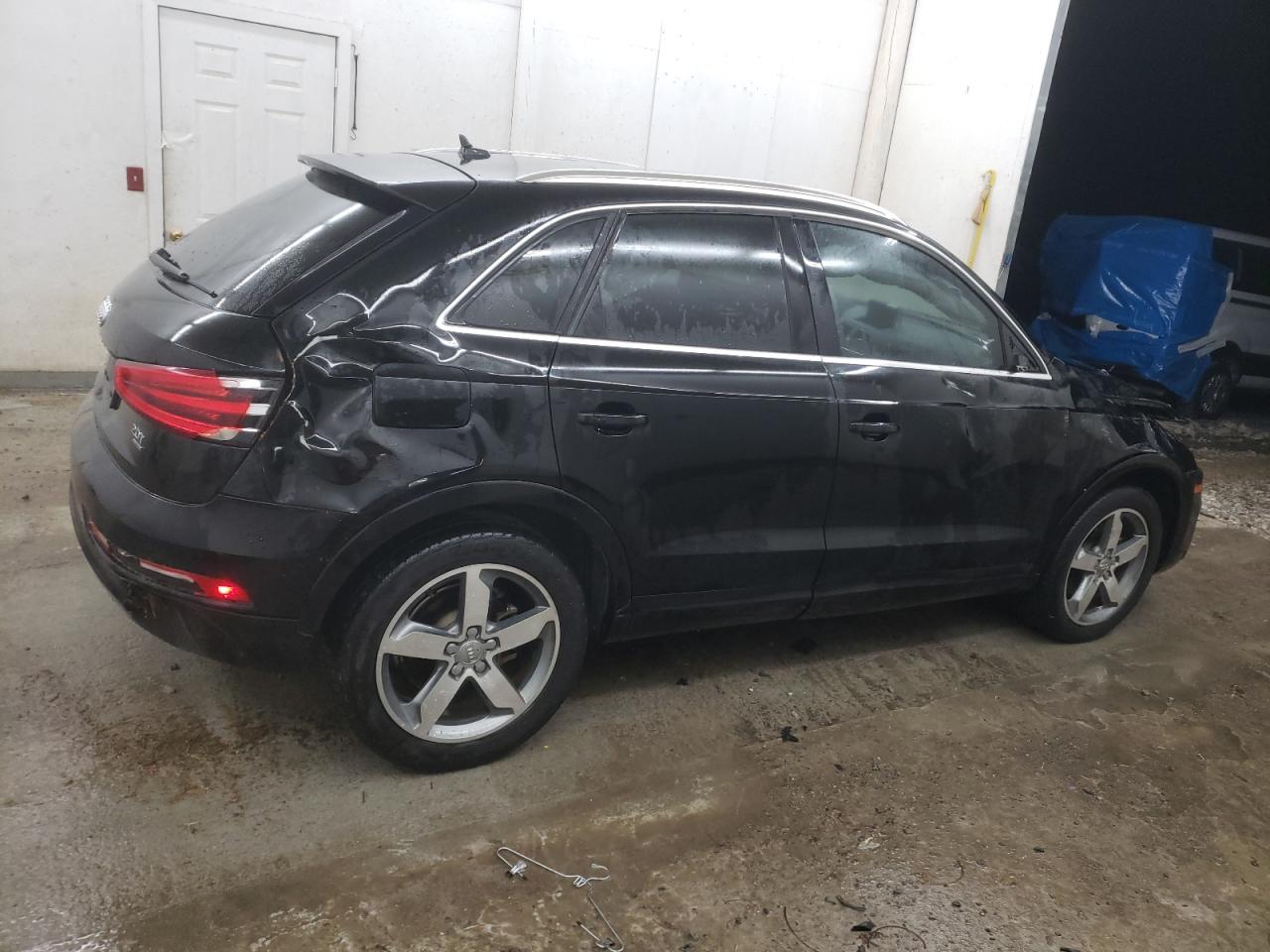 2015 Audi Q3 VIN WA1GFCFS6FR010439 Copart auction photo, rollover damage thumbnail 3