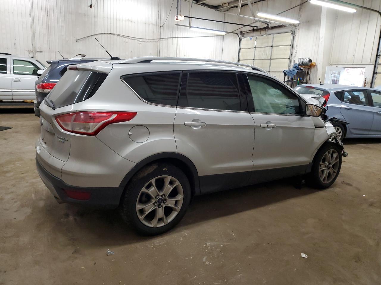 2015 Ford Escape VIN 1FMCU9JXXFUA43131 Copart auction photo, rollover damage thumbnail 3