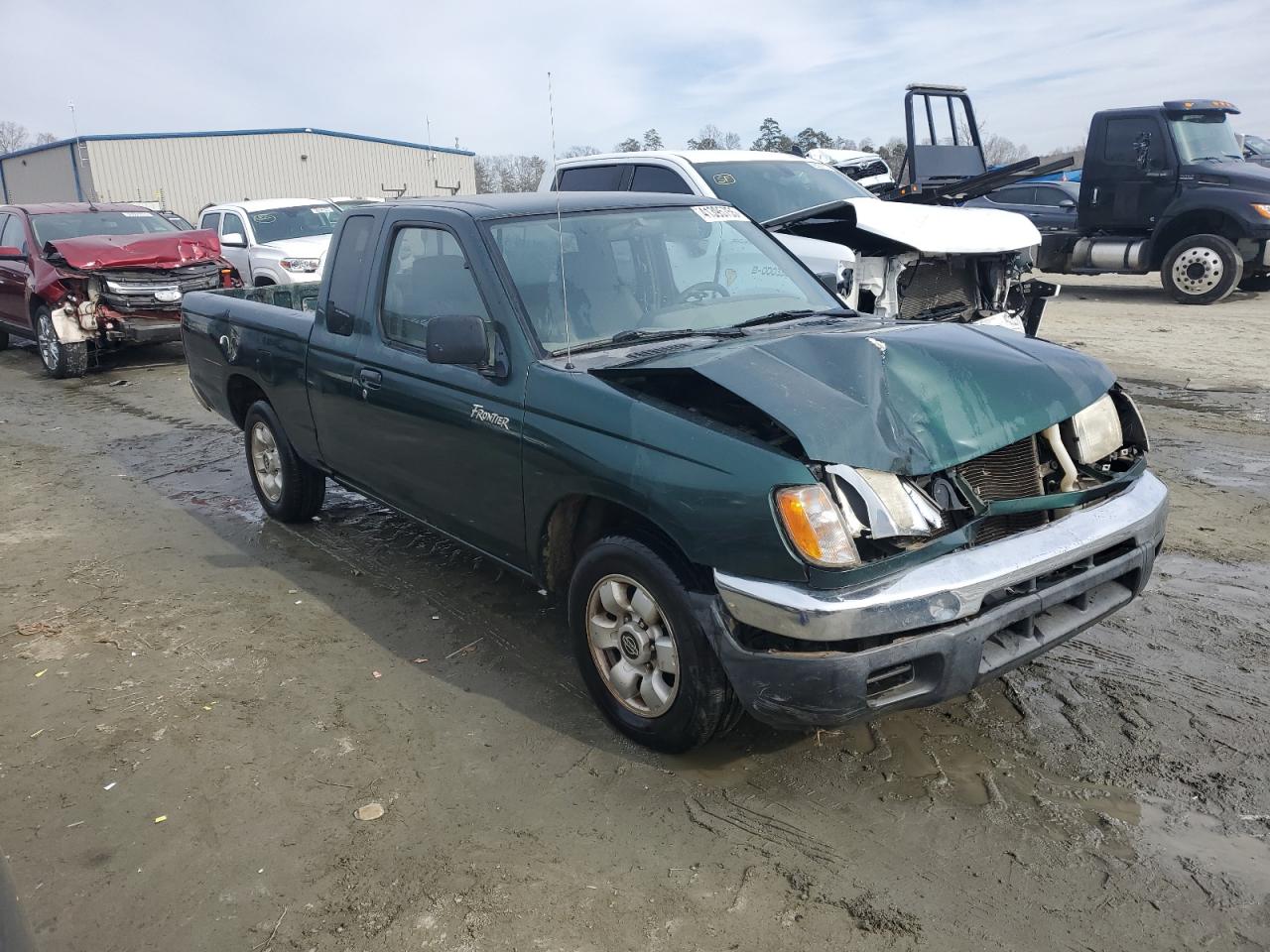 2000 Nissan Navara (Frontier) VIN 1N6DD26S4YC404131 Copart auction photo, front end damage thumbnail 4