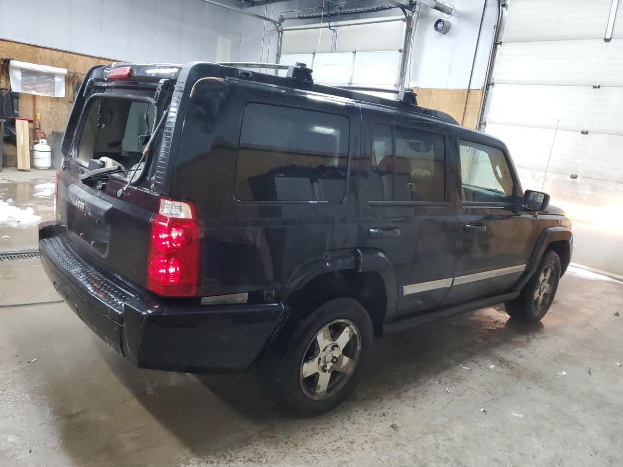 2010 Jeep Commander VIN 1J4RG4GK5AC153002 Copart auction photo, rear end / minor dent/scratches damage thumbnail 3