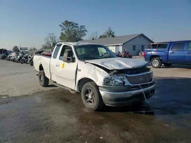 2000 Ford F-150 VIN 1FTZX172XYNB23013 Copart auction photo, all over damage thumbnail 10