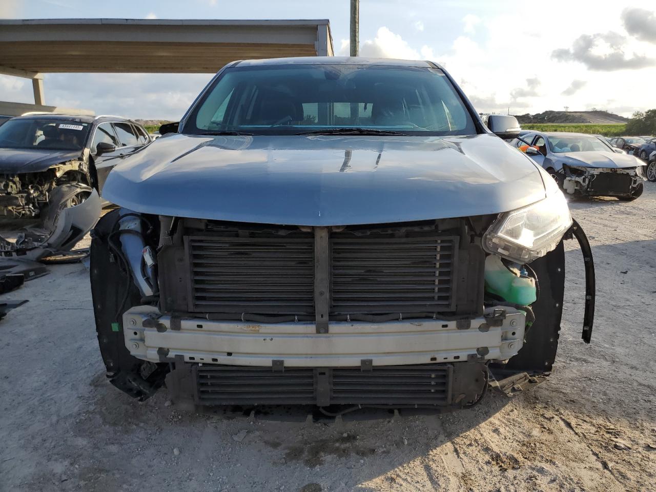 2018 Chevrolet Traverse VIN 1GNERGKW4JJ257669 Copart auction photo, front end / side damage thumbnail 5