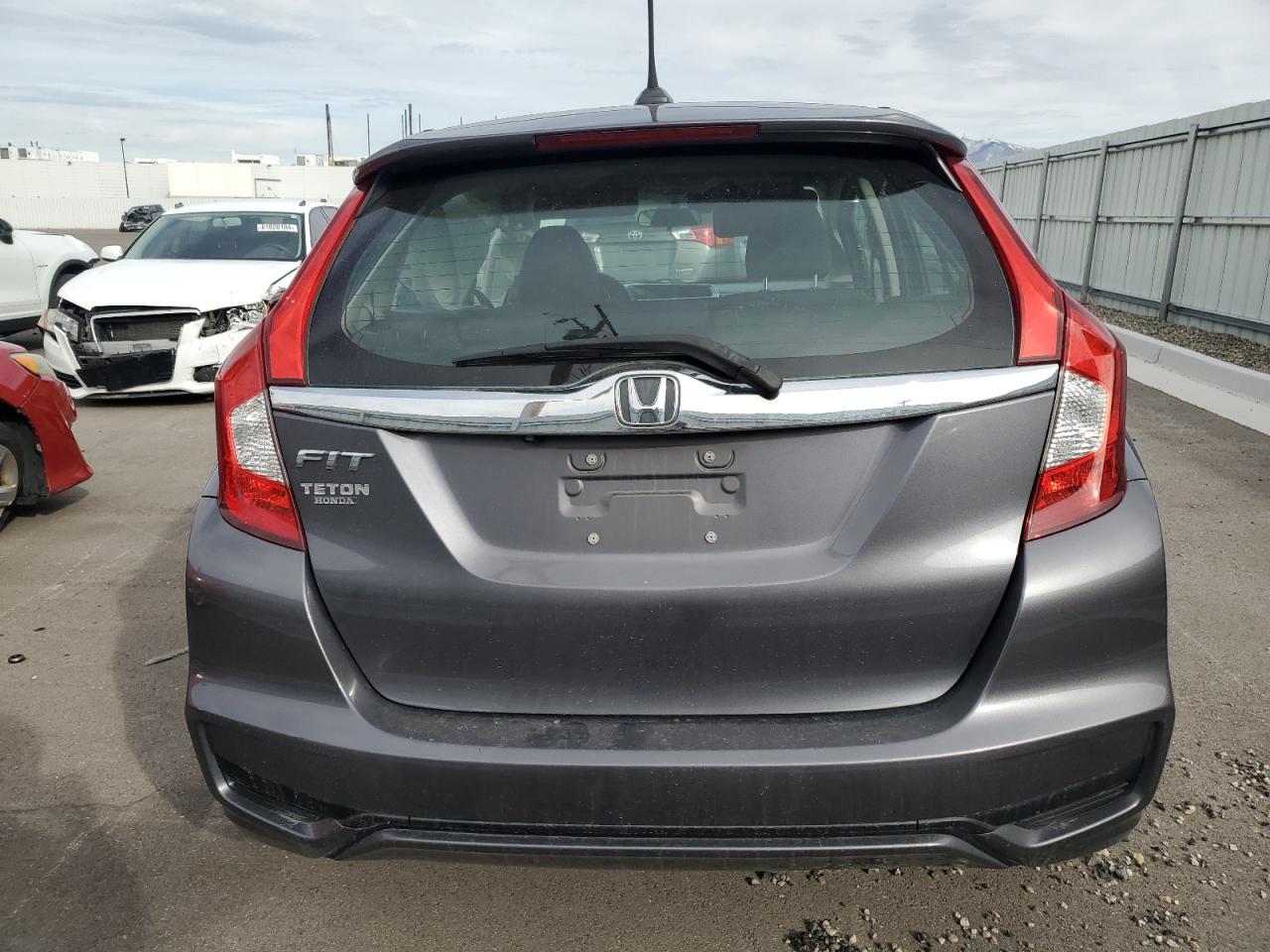 2020 Honda Fit VIN 3HGGK5H85LM712944 Copart auction photo, side / front end damage thumbnail 6