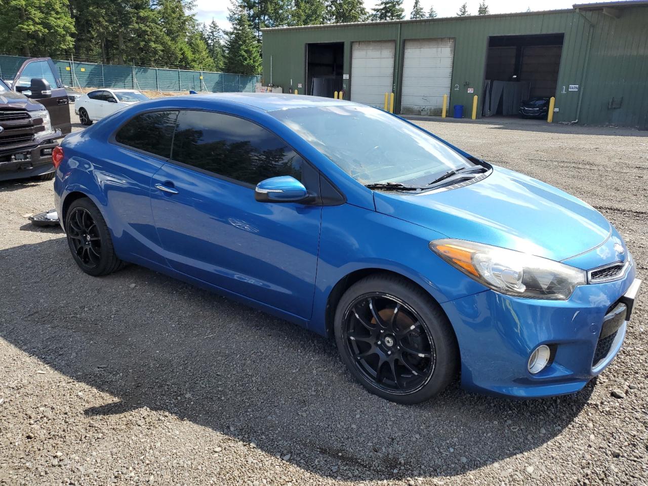 2015 KIA Forte VIN KNAFX6A88F5348487 Copart auction photo, vandalism damage thumbnail 4