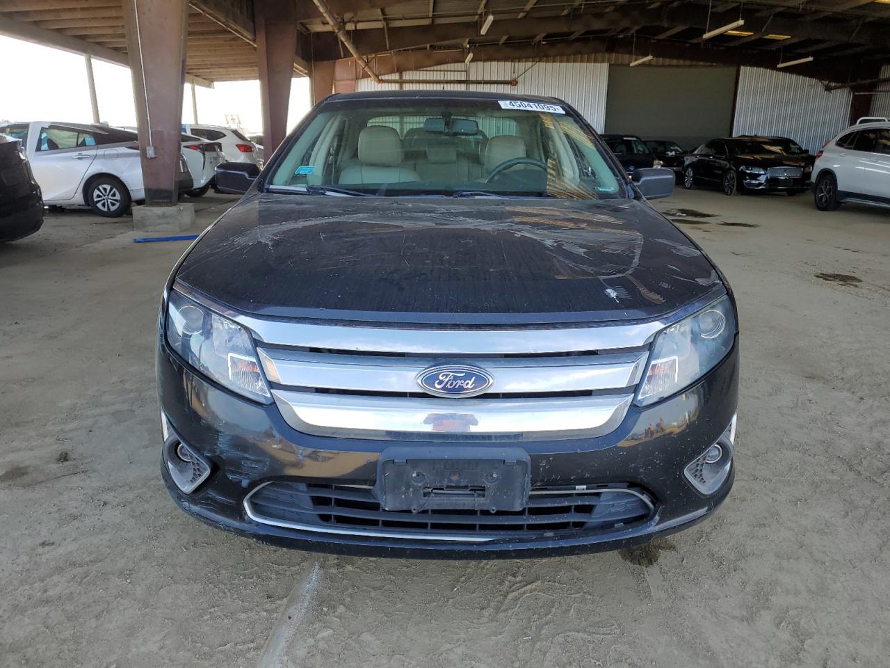 2010 Ford Fusion VIN 3FADP0L37AR354561 Copart auction photo, front end / side damage thumbnail 5