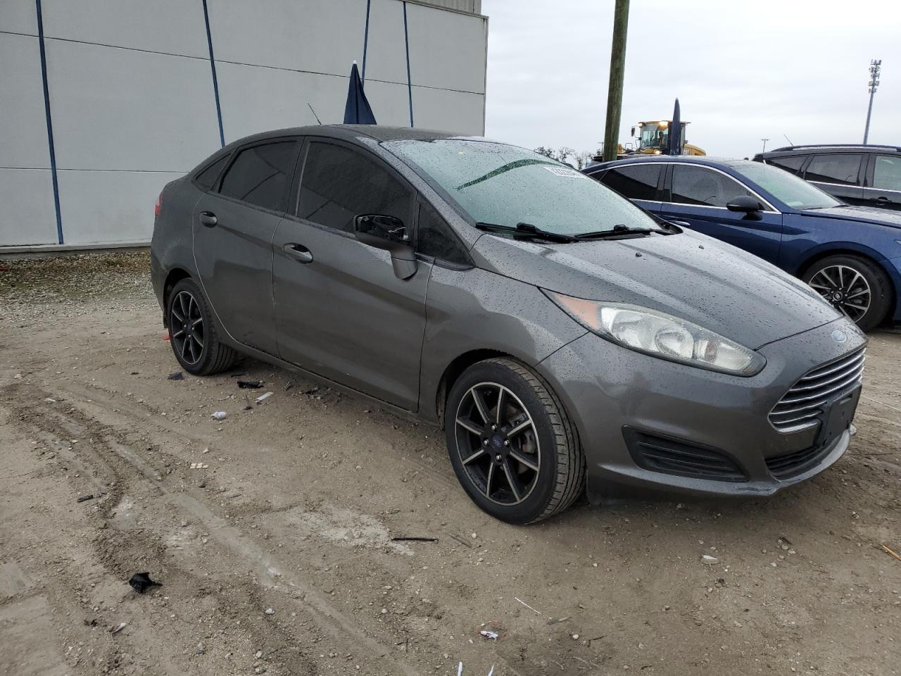2015 Ford Fiesta VIN 3FADP4BJXFM117672 Copart auction photo, minor dent/scratches damage thumbnail 4