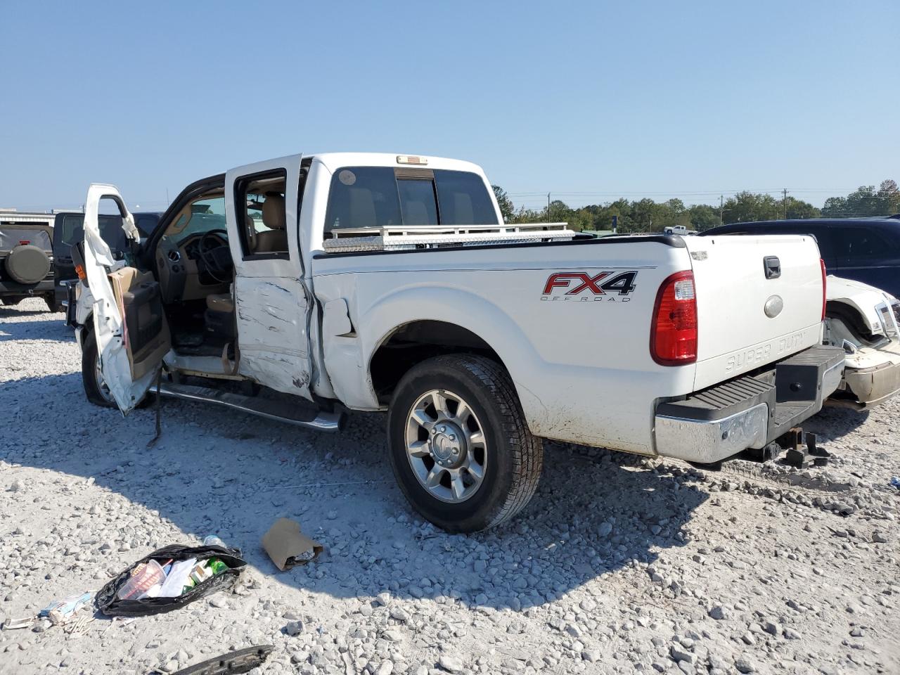2012 Ford F250 VIN 1FT7W2BTXCEC53141 Copart auction photo, side / front end damage thumbnail 2