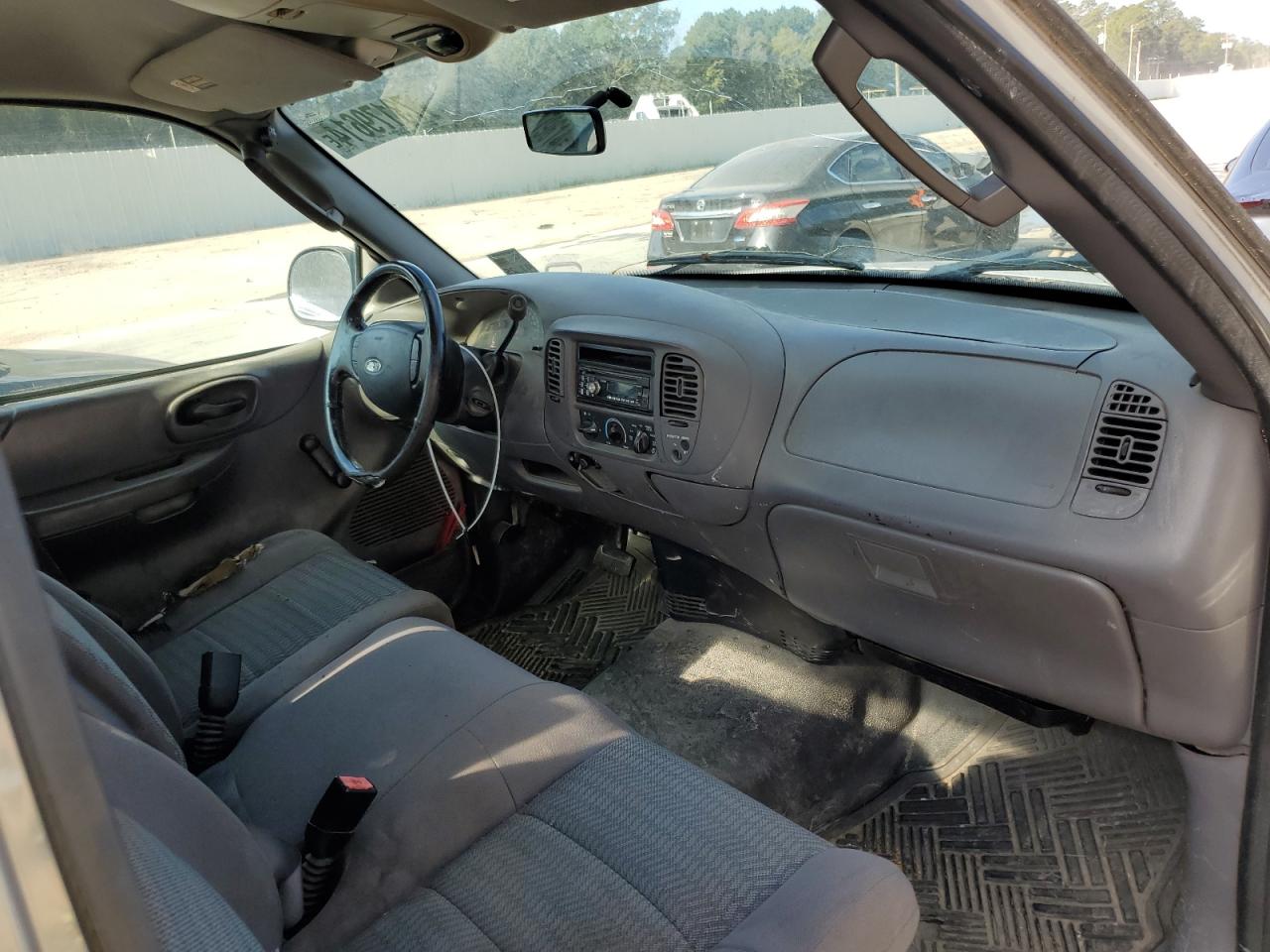 2003 Ford F-150 VIN 1FTRX17203NB06293 Copart auction photo, side damage thumbnail 8