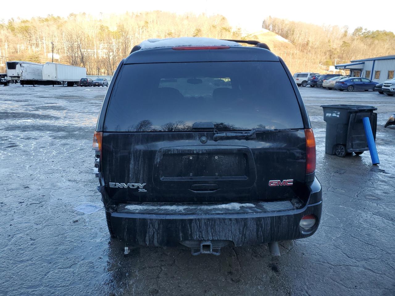 2005 GMC Envoy VIN 1GKET16S556105671 Copart auction photo, rear end / front end damage thumbnail 6