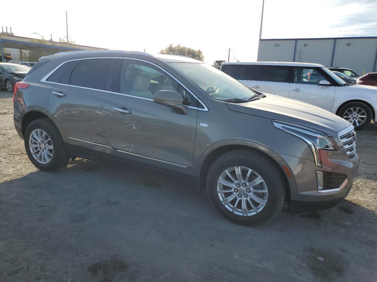 2018 Cadillac XT5 VIN 1GYKNARS1JZ116528 Copart auction photo, side damage thumbnail 4