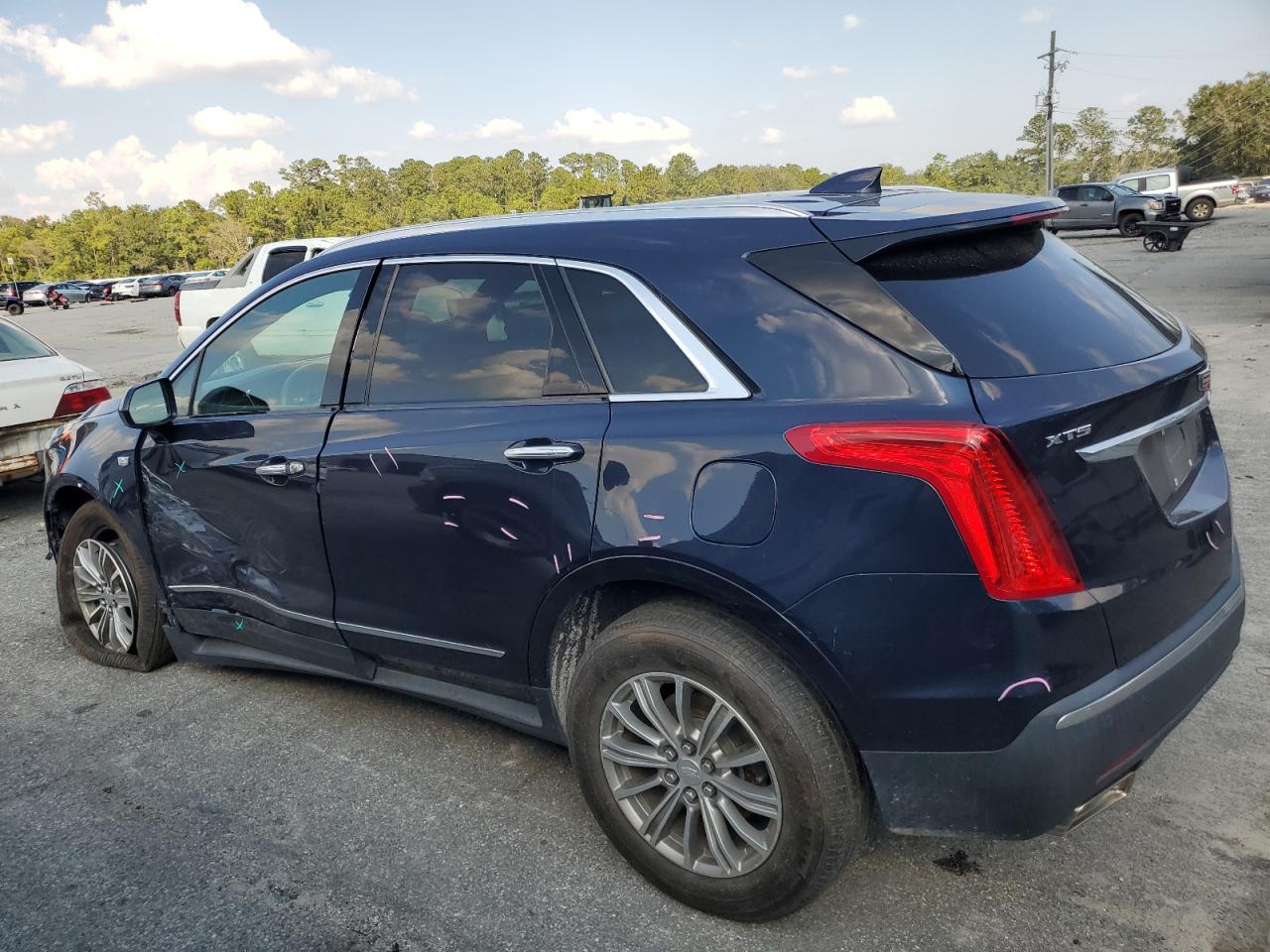 2017 Cadillac XT5 VIN 1GYKNBRS5HZ175548 Copart auction photo, side / front end damage thumbnail 2