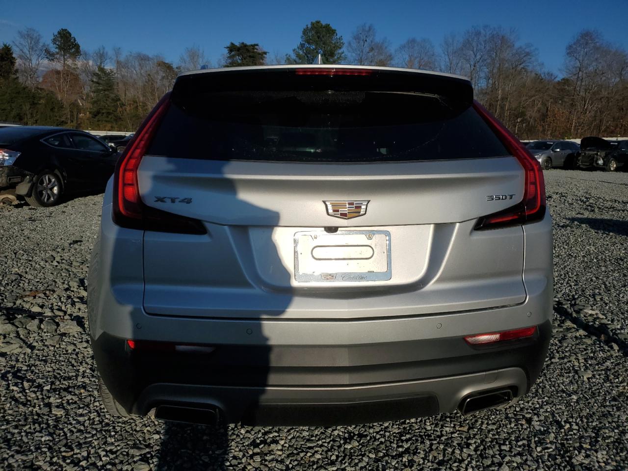 2021 Cadillac XT4 VIN 1GYFZCR45MF002279 Copart auction photo, front end / side damage thumbnail 6