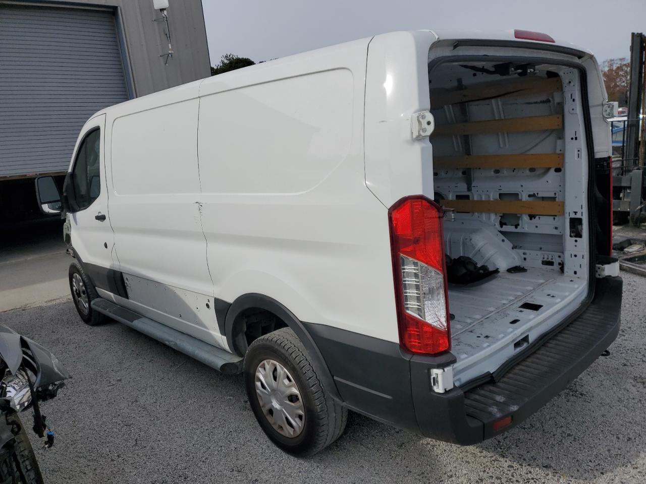 2023 Ford Transit VIN 1FTBR1Y85PKA77962 Copart auction photo, all over damage thumbnail 2
