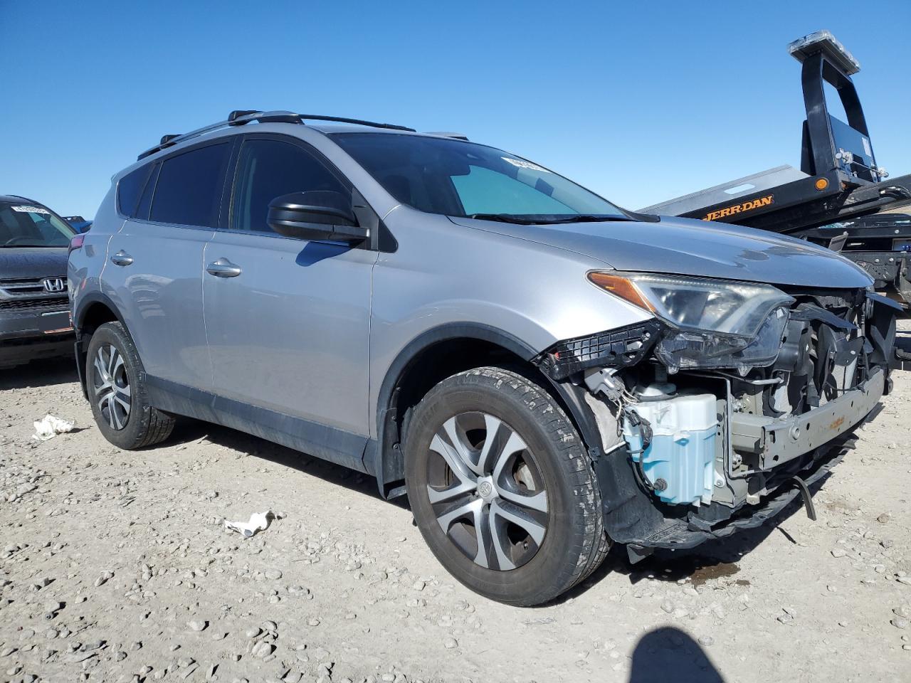 2017 Toyota RAV 4 VIN 2T3BFREV1HW663827 Copart auction photo, front end damage thumbnail 4