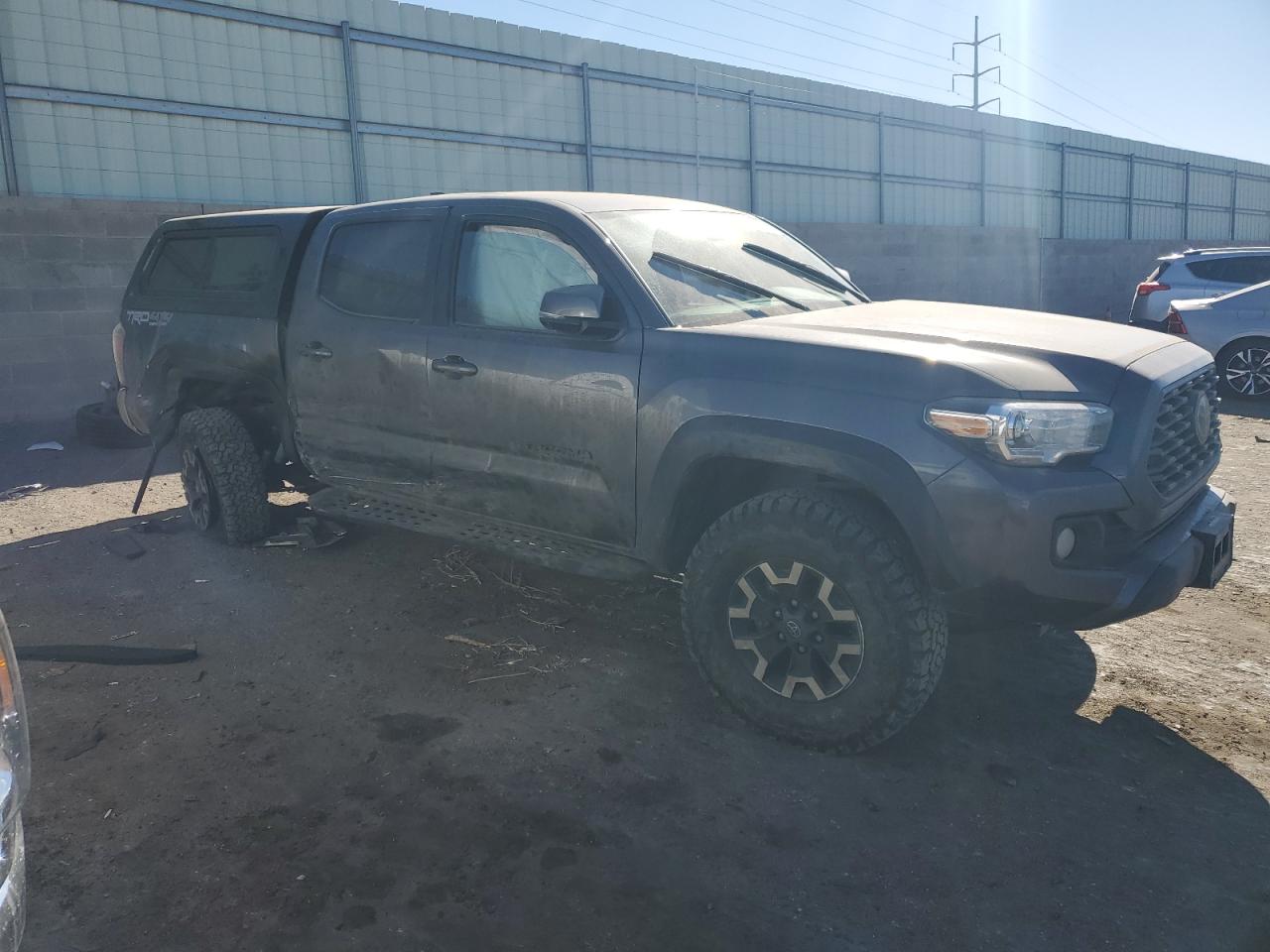 2022 Toyota Tacoma VIN 3TYCZ5ANXNT085044 Copart auction photo, side / rear end damage thumbnail 4