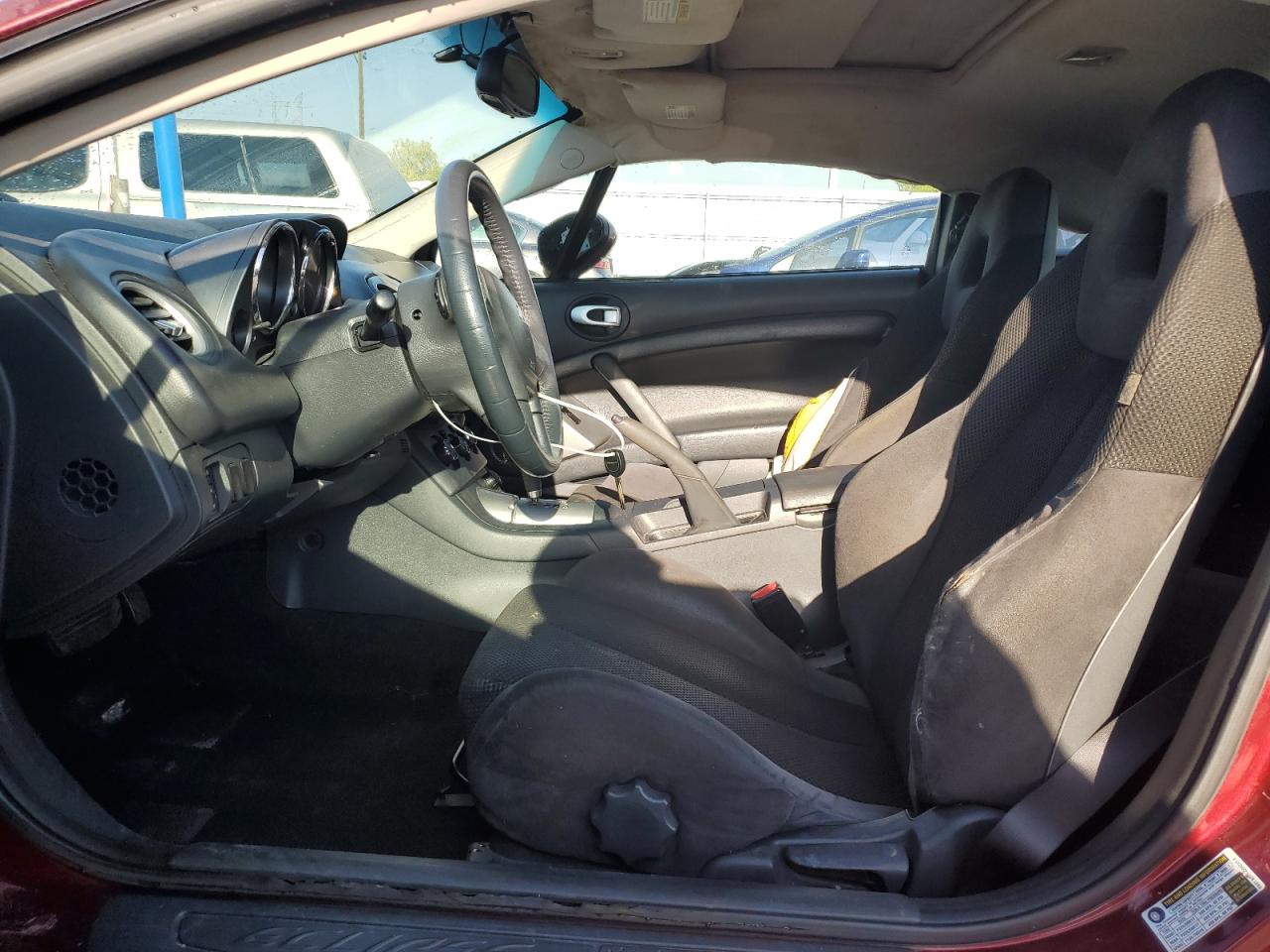 2007 Mitsubishi Eclipse VIN 4A3AK24F57E010932 Copart auction photo, side / front end damage thumbnail 7