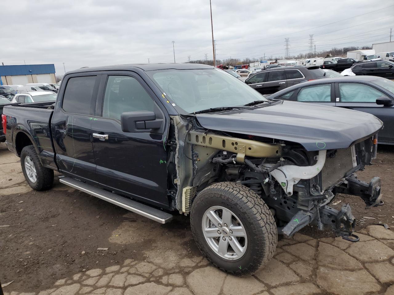 2023 Ford F-150 VIN 1FTFW1E53PKD33780 Copart auction photo, front end / side damage thumbnail 4