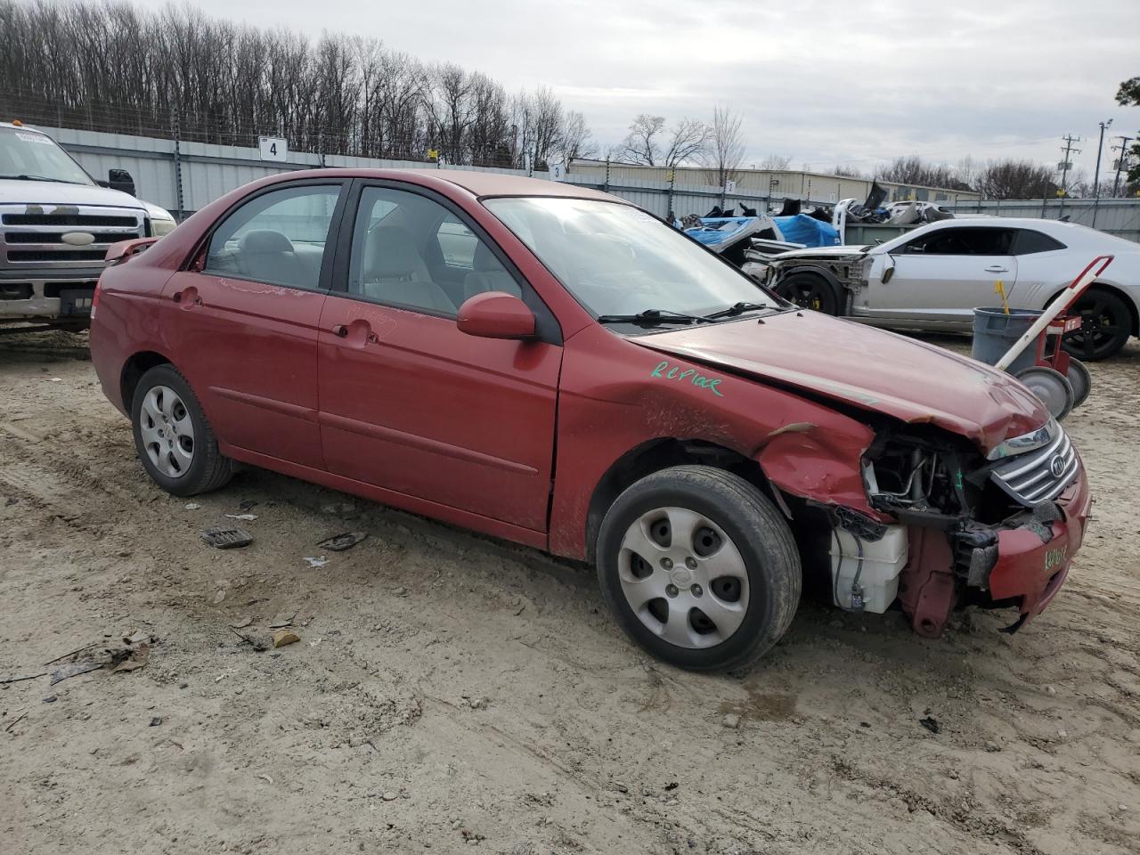 2009 KIA Spectra VIN KNAFE221695616392 Copart auction photo, front end / minor dent/scratches damage thumbnail 4